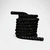 Black gym battle rope with yellow accents on a white background