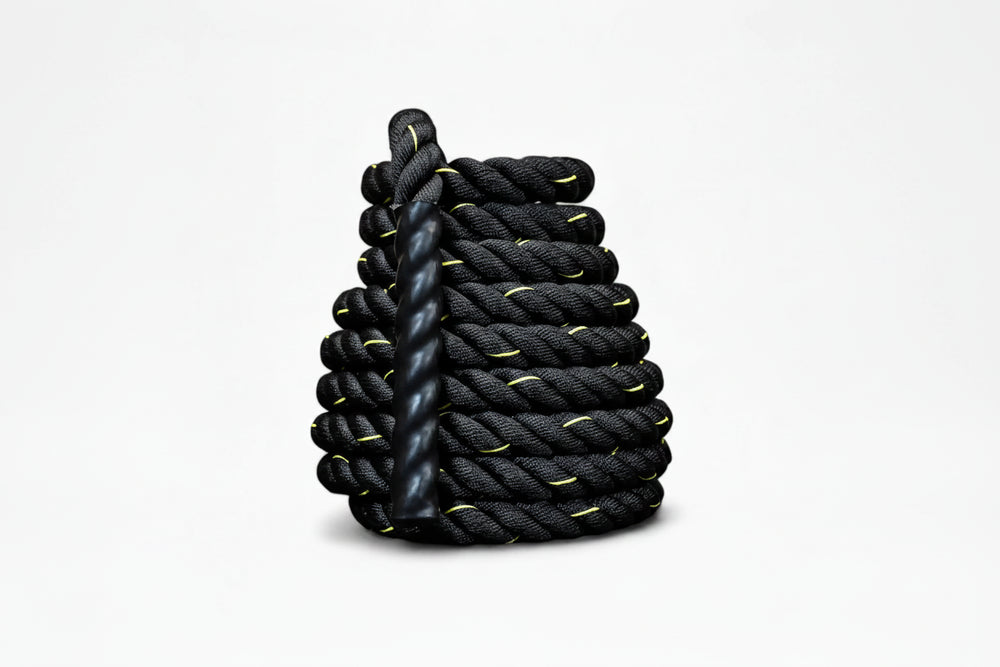 Black battle rope with yellow accents on a white background