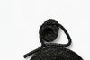Black and yellow rope with a knot on a white background