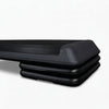 Black aerobics stepper on a white background