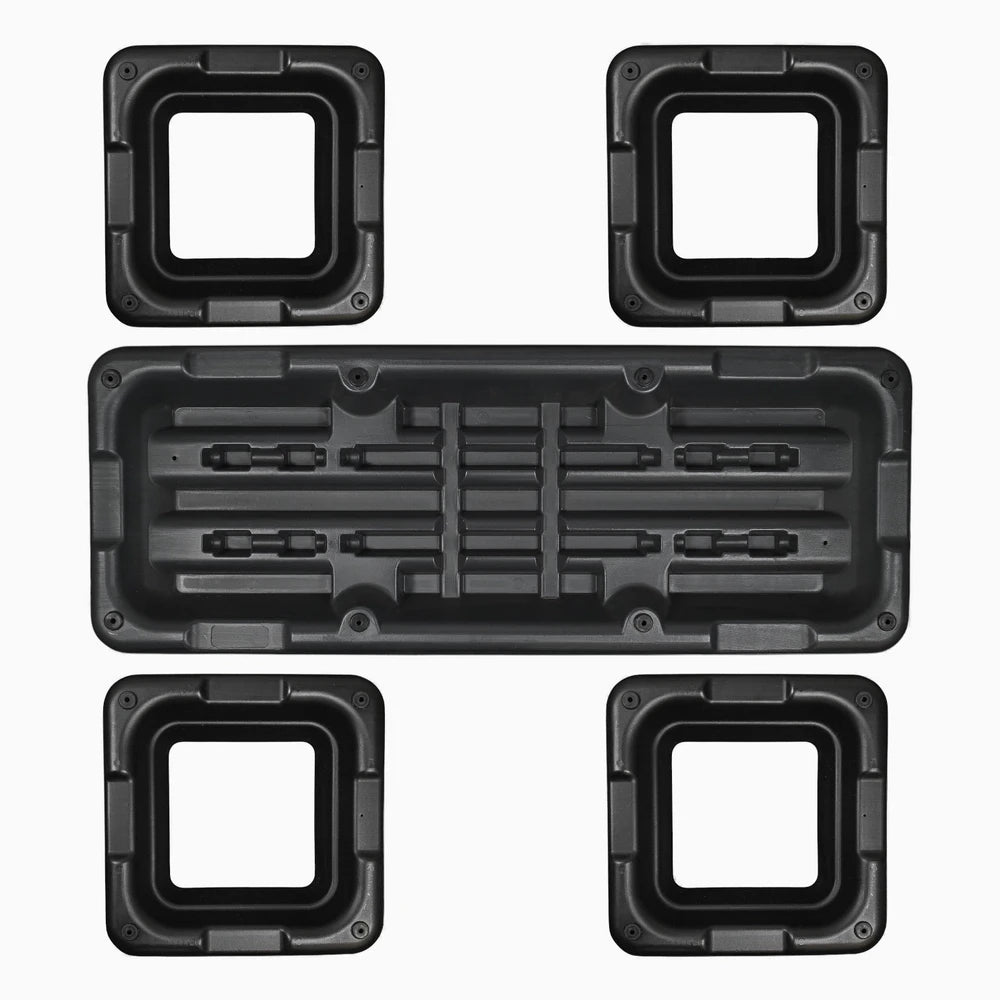 Underside of an aerobics stepper and height adjustment platforms on a white background