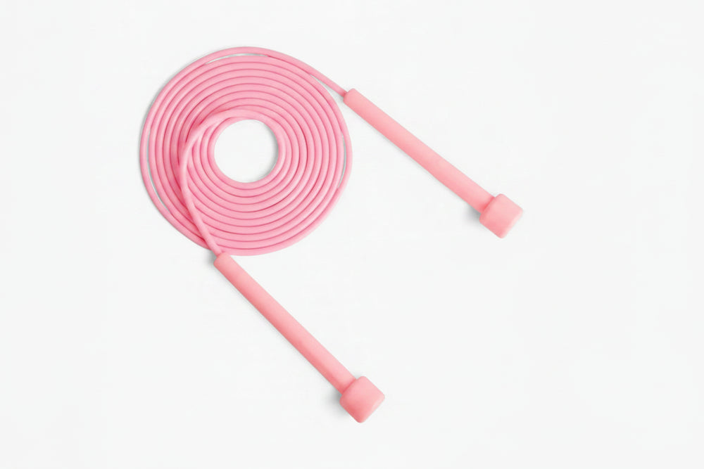 Pink core pace jump rope on a white background