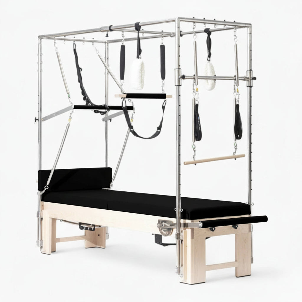 Essential cadillac pilates reformer machine with attachments on a white background Main image