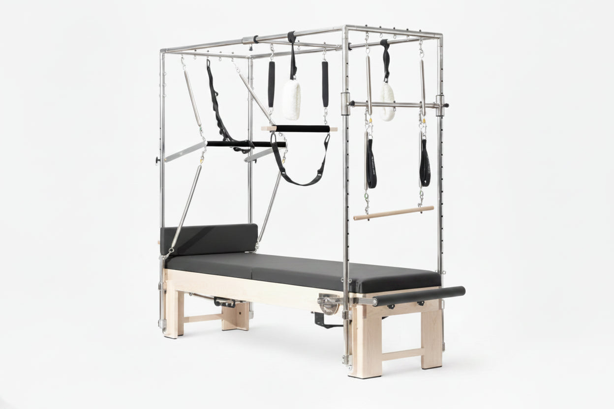 Essential cadillac pilates reformer machine with attachments on a white background Main image