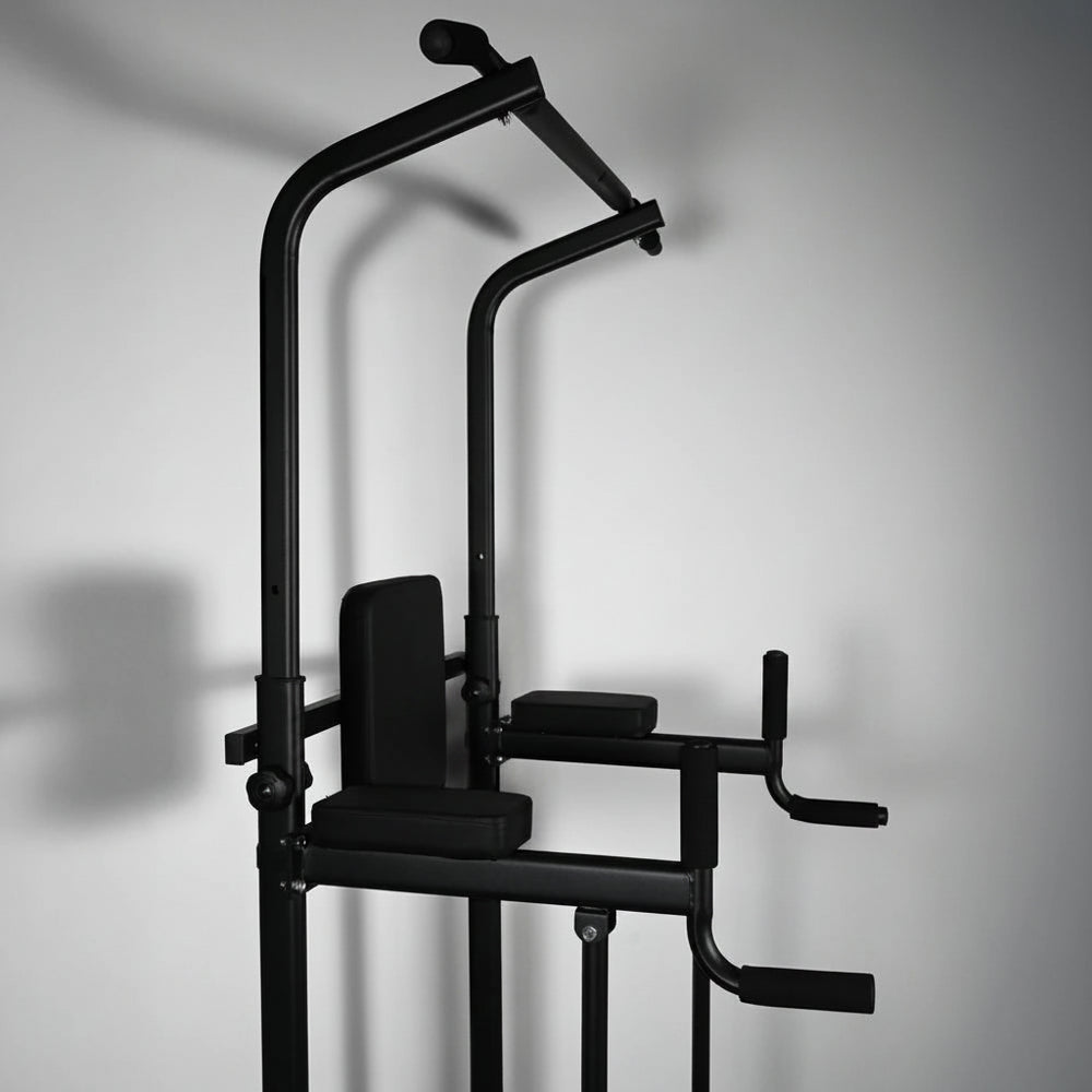 Black pull-up bar and weight stand against a gray background