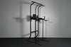 Black pull-up bar against a gray wall.
