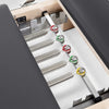 Springs of a pilates reformer machine with dark cushion seats