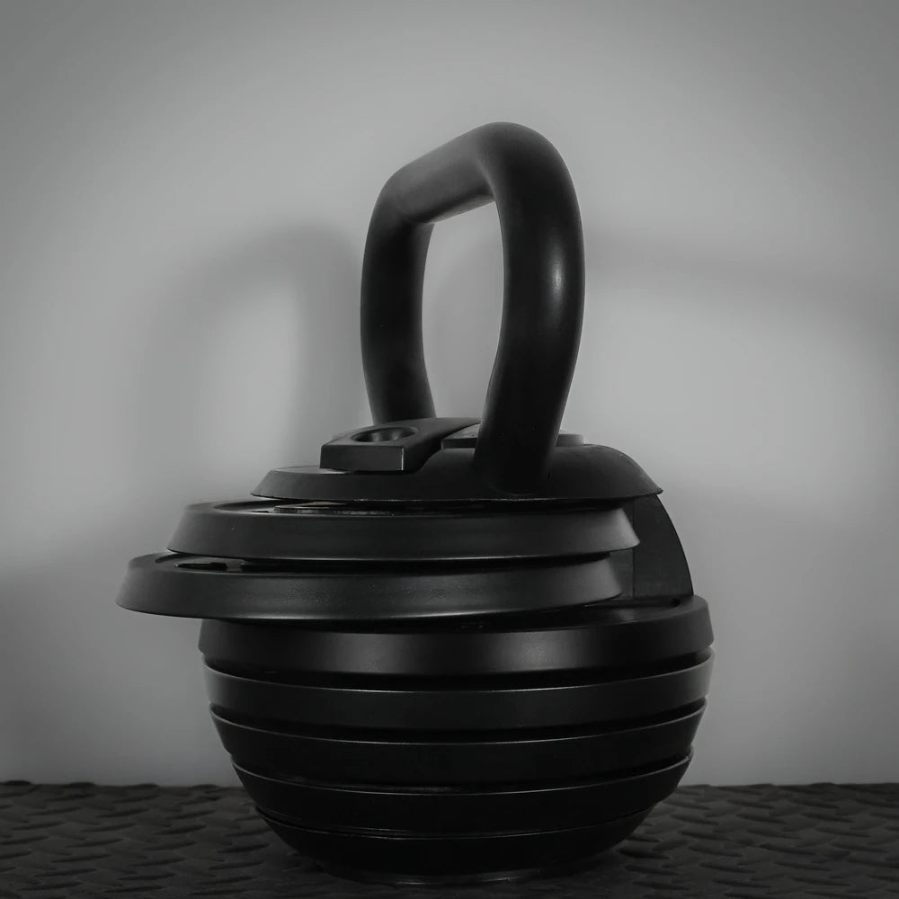 Adjustable kettlebell on a dark background