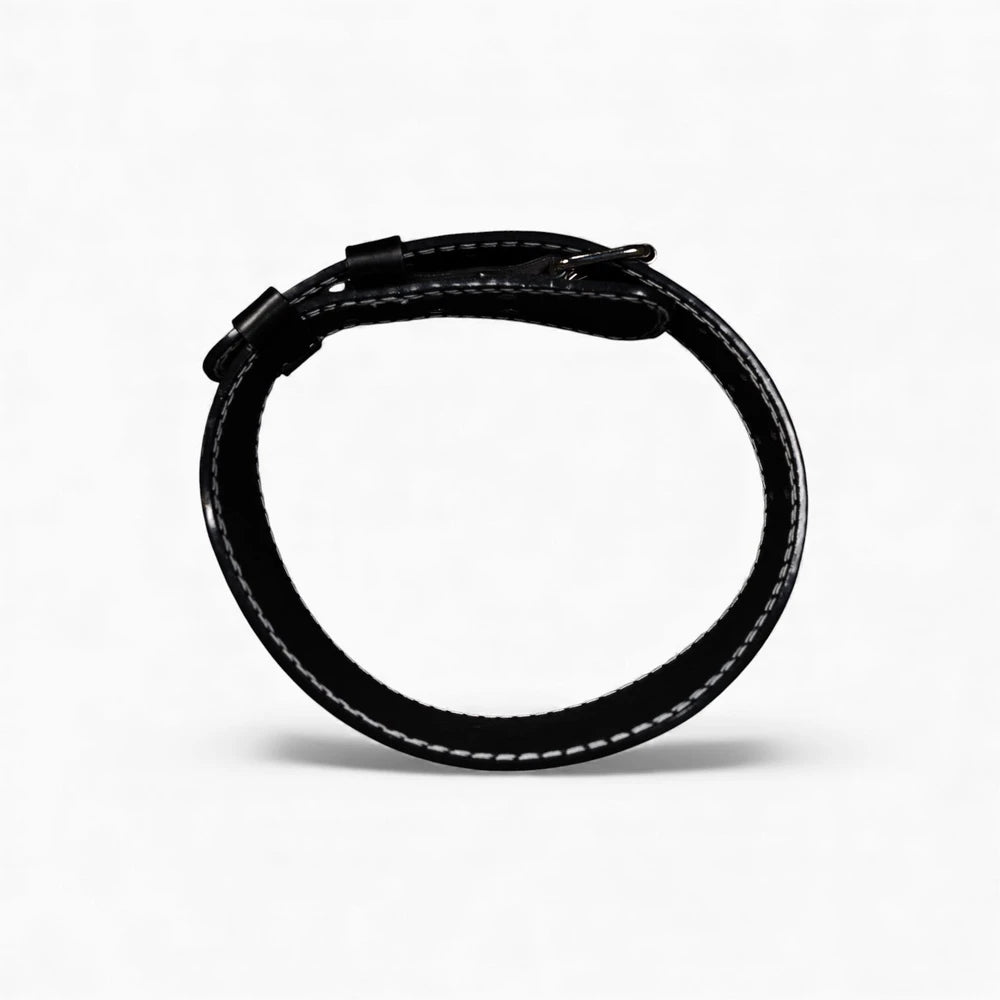 Fastened weight lifting belt on a white background