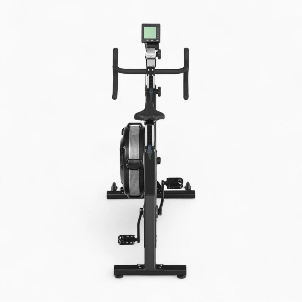 Black exercise bike with digital display on a white background
