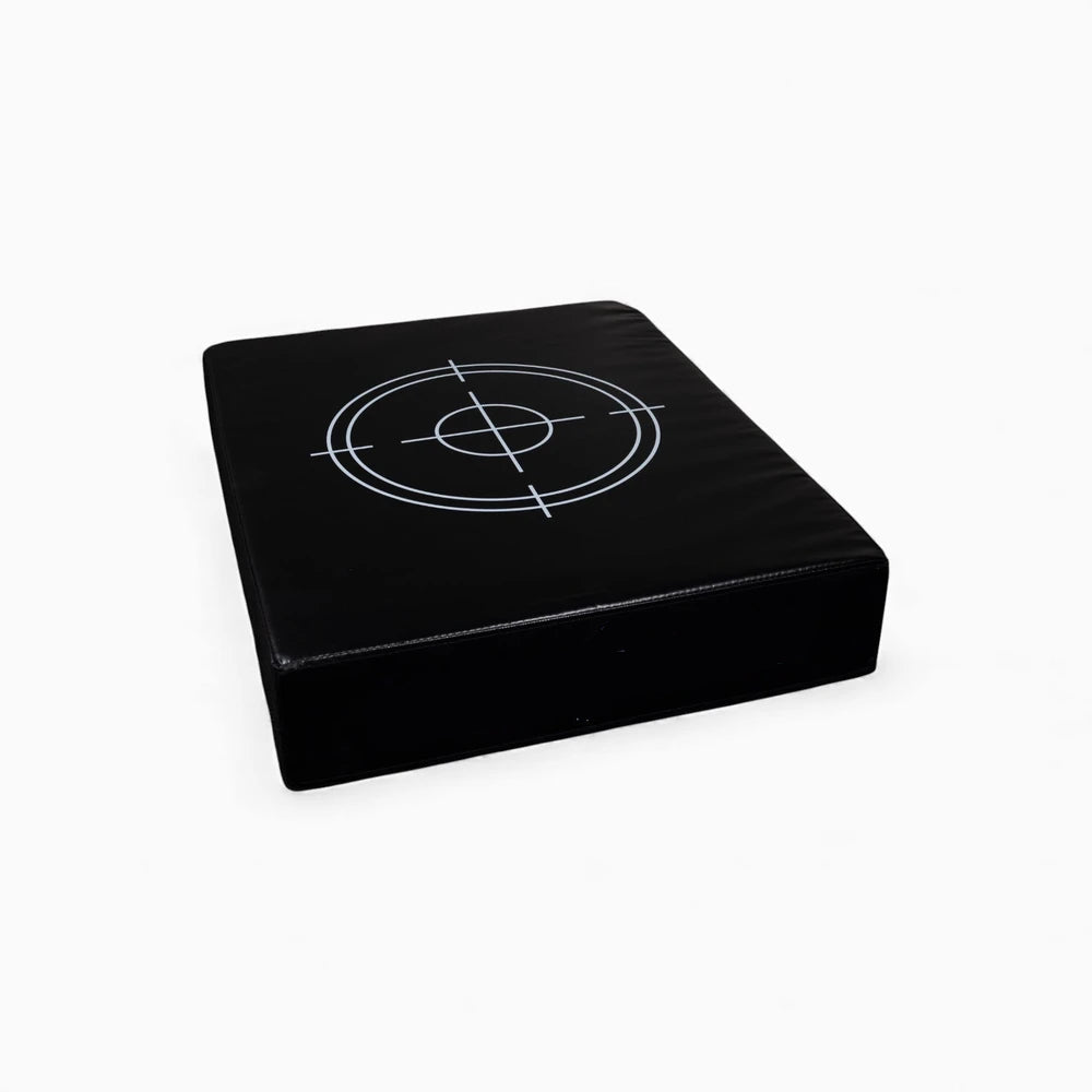 Black weights drop pad on a white background