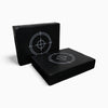 Two black drop pads with target design on a white background