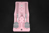 Pink and gray pilates reformer board on a black textured background