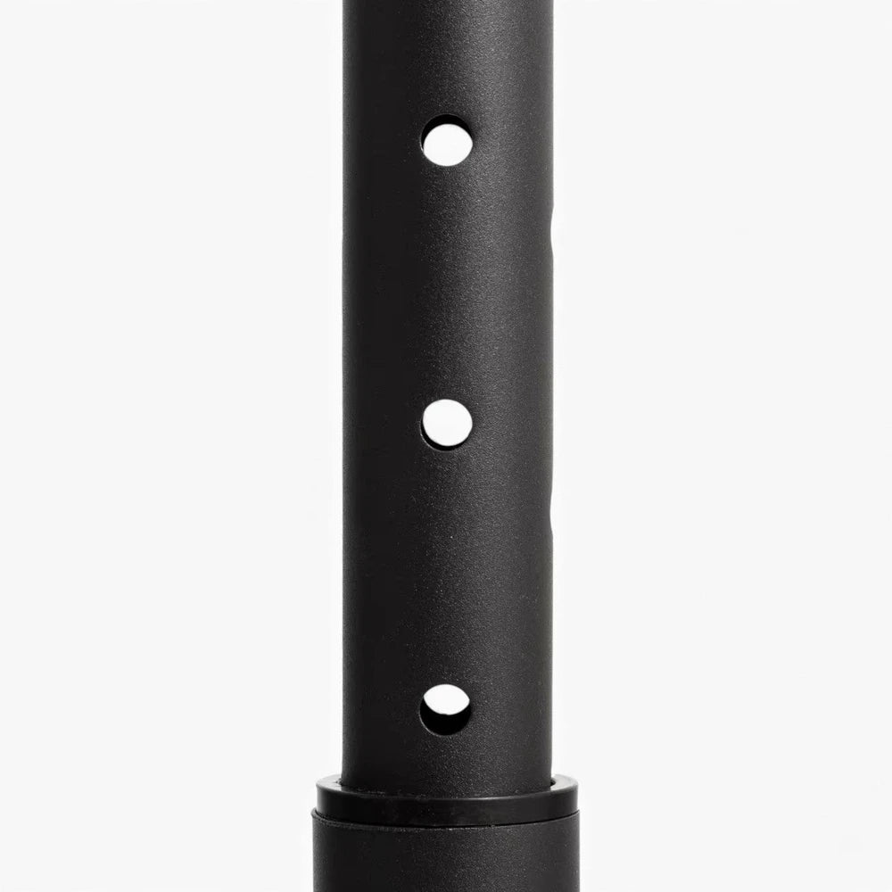 Adjustment holes for dip bars on a white background