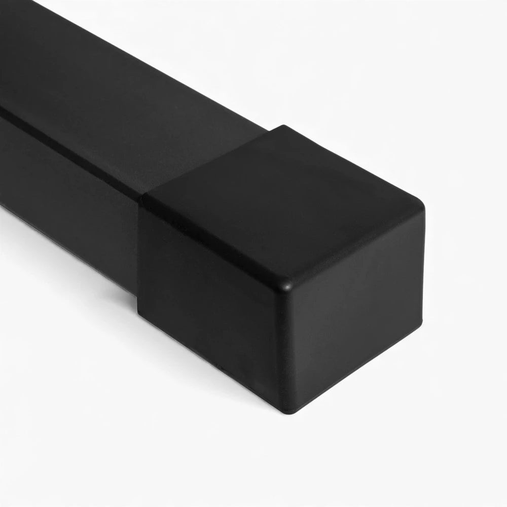 Black sturdy leg of a dip bar on a white background