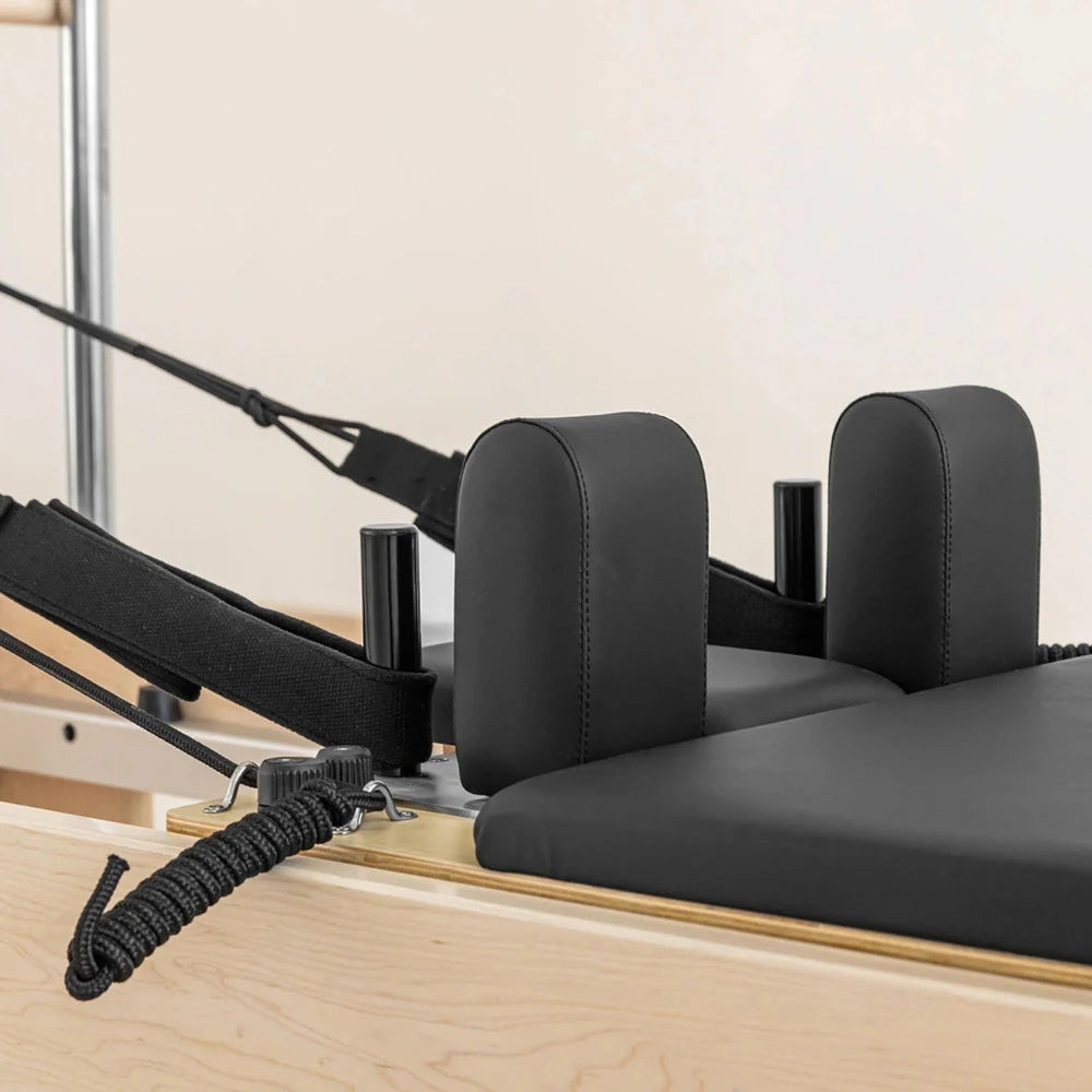 Shoulder rests and headrests on a pilates machine