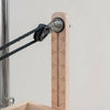 Wooden adjustment with measurement scale on a white background
