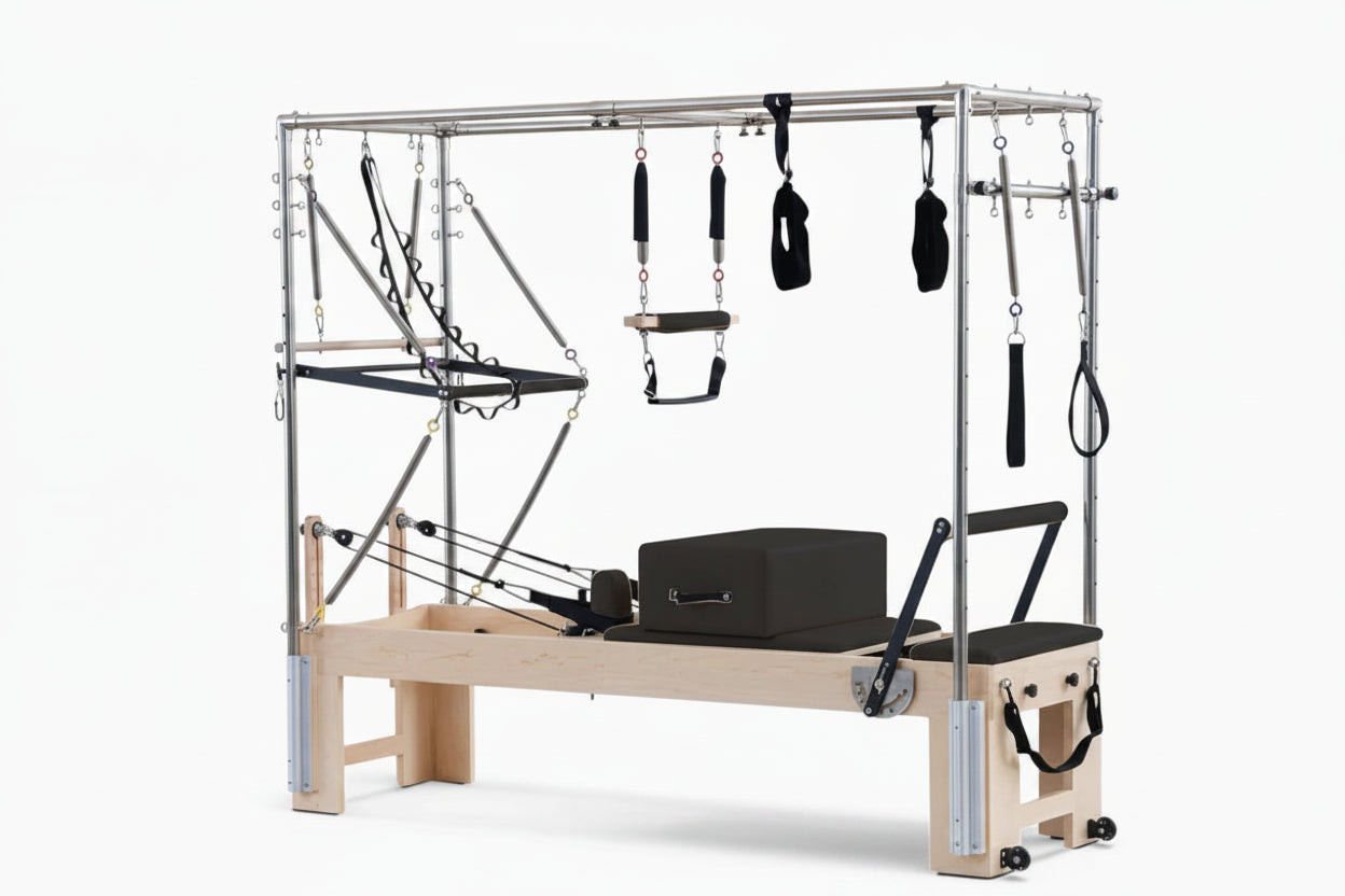 Pilates reformer with attachments on a white background Main image