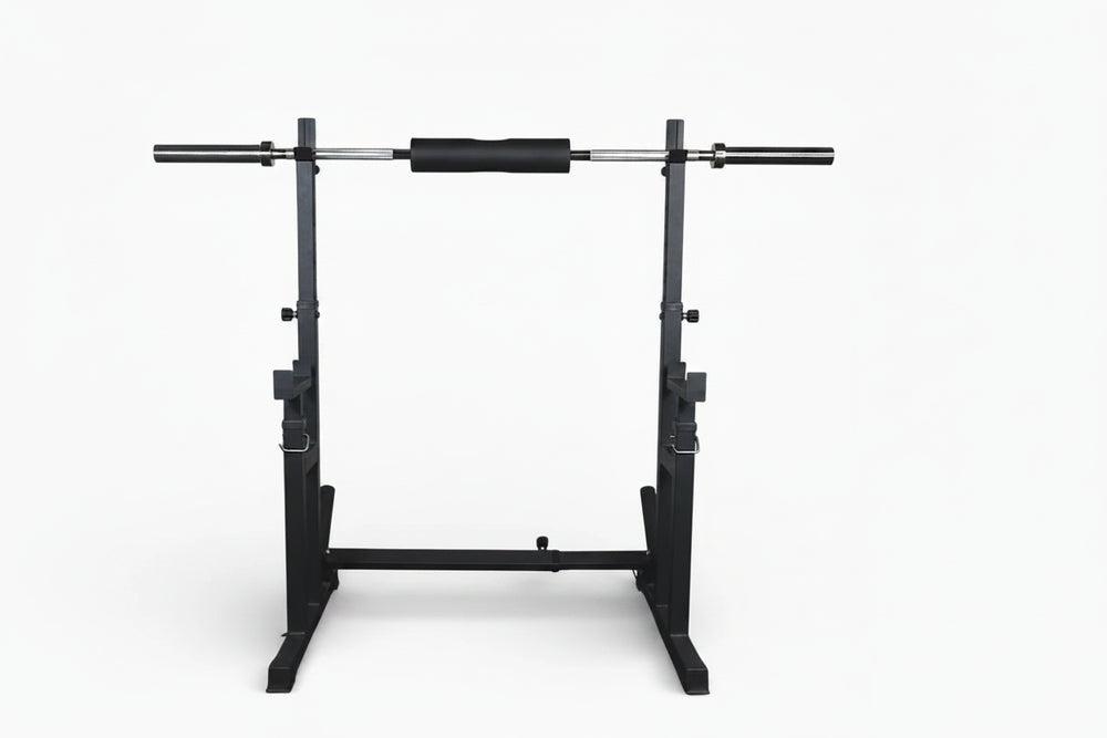 Black squat pad on a barbell loaded onto a gym machine