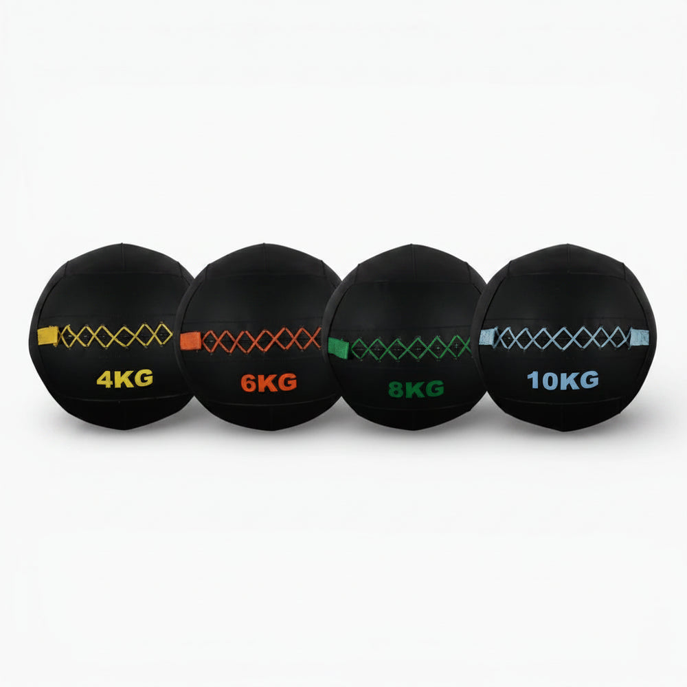 Set of four wall balls at different weights on a white background