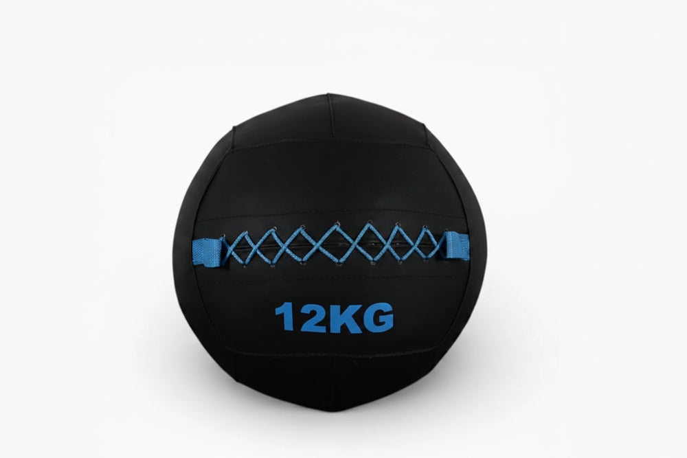 Black wall ball with 12kg text and blue accents on a white background