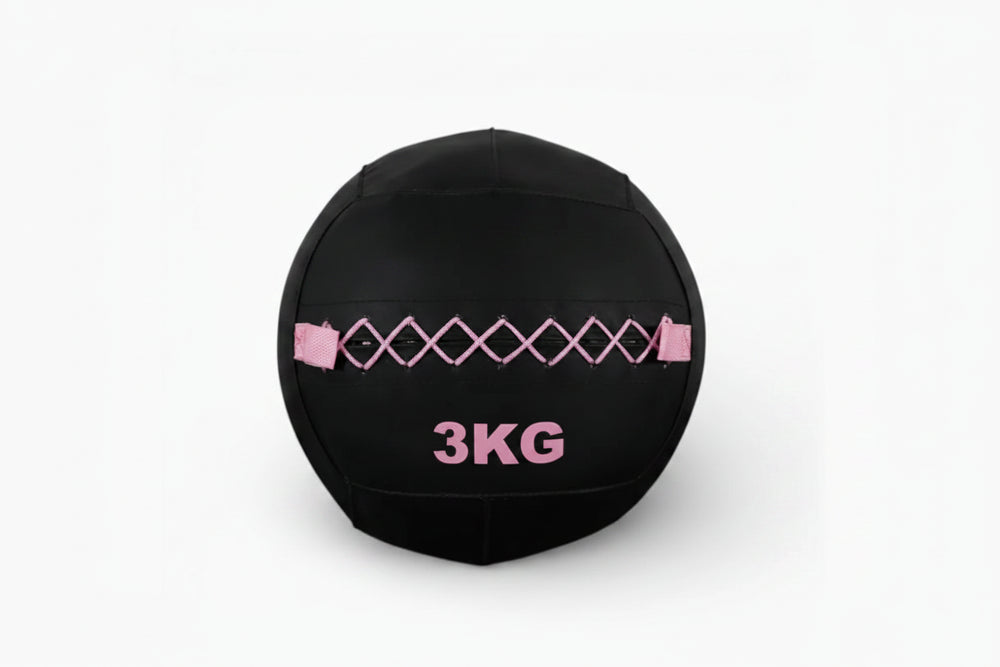 Black 3kg slam ball with pink accents on a white background