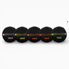 Set of five black weighted balls with color-coded weight labels on a white background