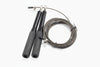 Black jump rope with metal clasps on a white background