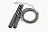 Black jump rope with metal clasps on a white background