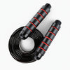Black and red jump rope on a white background