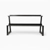 Black metal weights rack with two levels on a white background