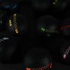 Group of wall balls with different weights on a dark background