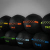 Rows of slam balls at different weights and colour coding on a dark background
