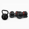 Black kettlebell and adjustable dumbbells on a white background