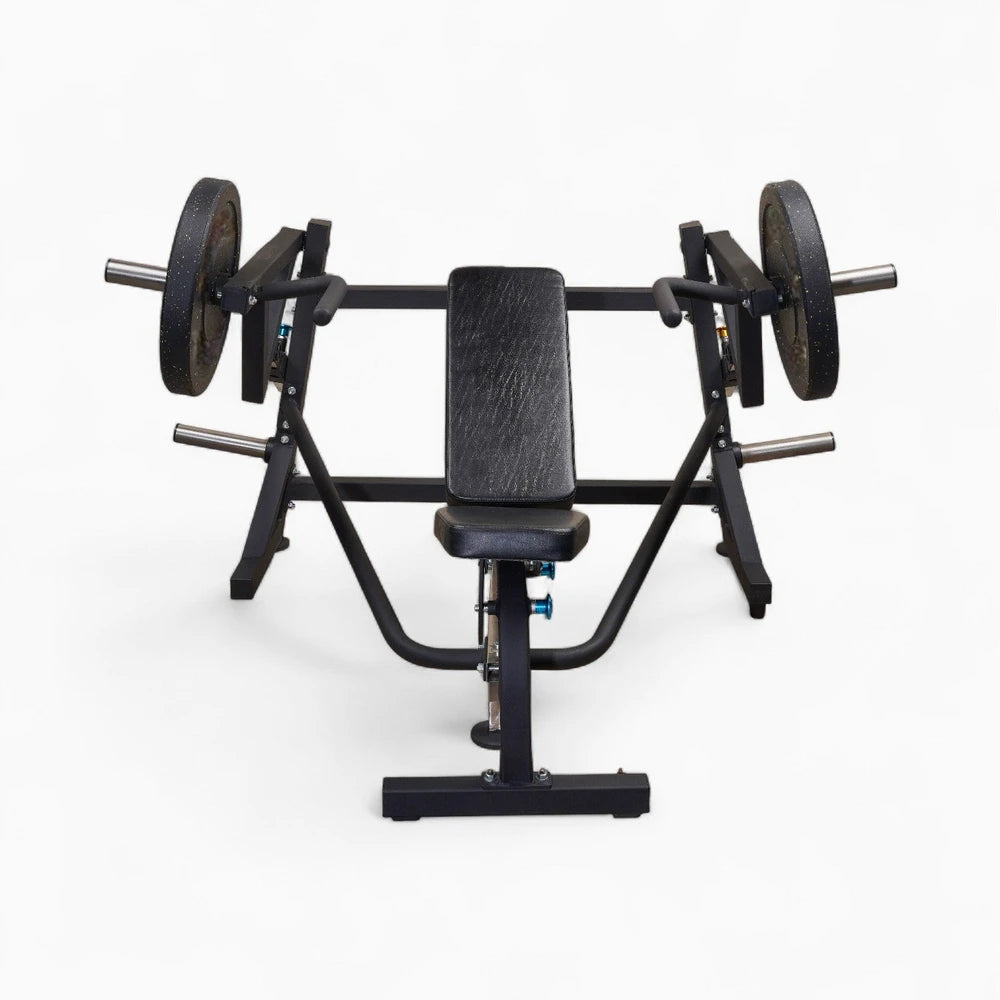 Weight plates loaded onto a commercial chest press machine on a white bacground