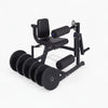Semi-commercial leg extension and hamstring curl machine with weight plate set on a white background