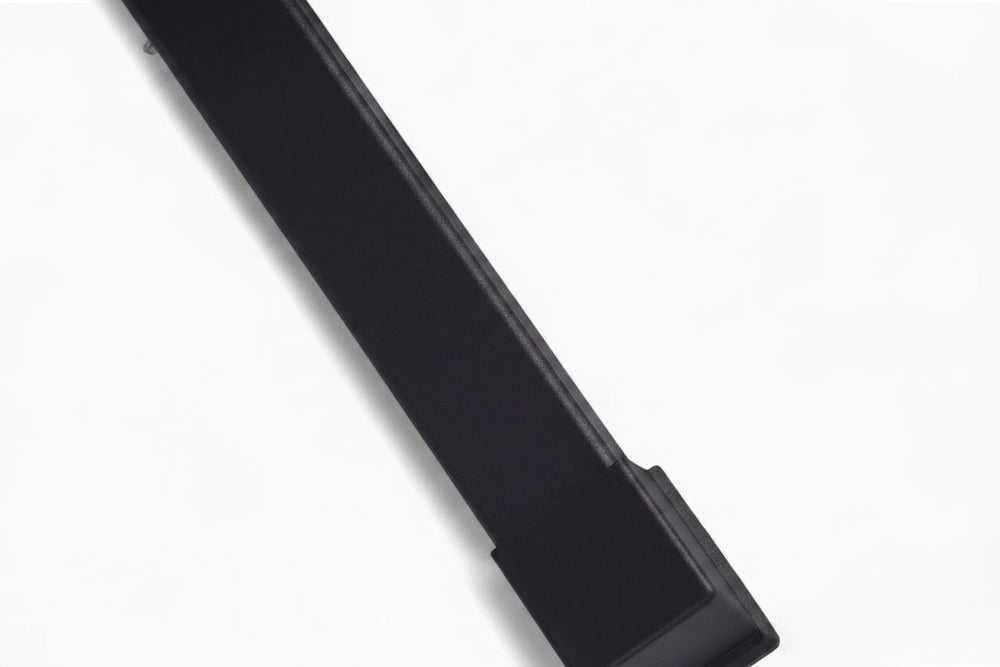 Sturdy metal leg support for gym machine on a white background