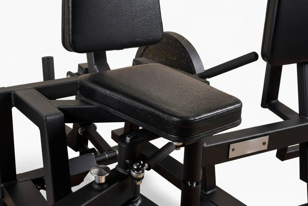 Black gym machine with cushioned seat on a white background
