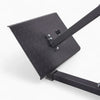 Black metal footplate with a textured surface on a white background