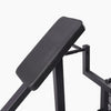 Black weight bench on a white background
