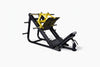Black and yellow leg press machine on a white background