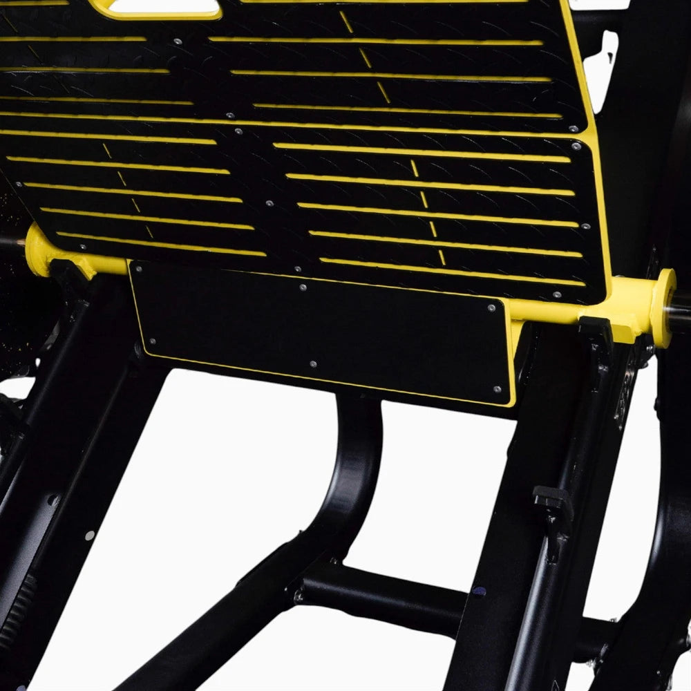Close-up of a black and yellow mechanical component on a white background