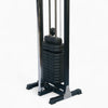 Gym cable machine with weight stack on a white background