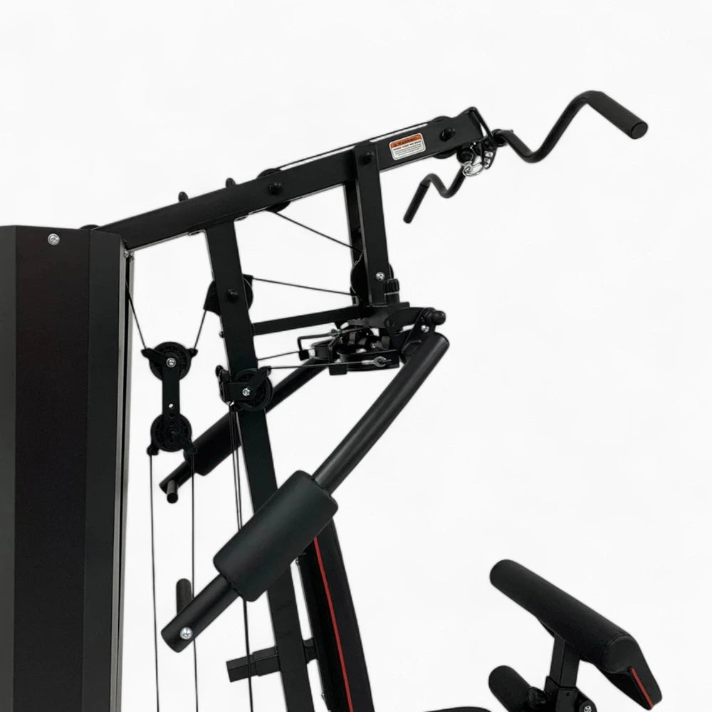 Black gym machine with pulleys on a white background