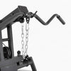 Close-up of a black exercise machine with a chain on a white background