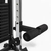 Adjustable leg lockdown rollers attached to vertical guide rail