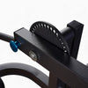 Pin adjustment dial on a commercial Leg Extension and Curl Machine on a white background