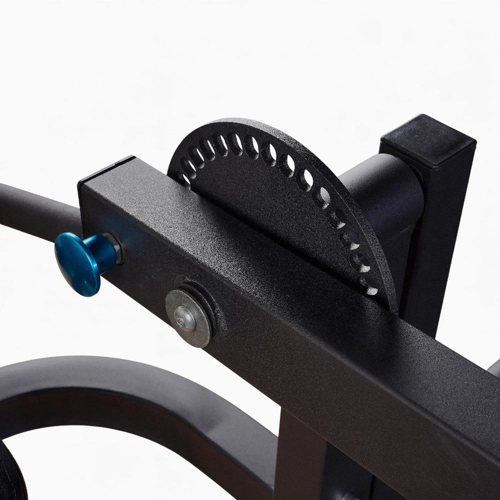 Pin adjustment dial on a commercial Leg Extension and Curl Machine on a white background