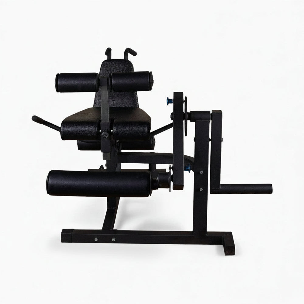 Black steel commercial leg extension and curl machine on a white background