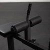 Knee pad adjustment with pop pin and release handle assembly of a calf raise machine